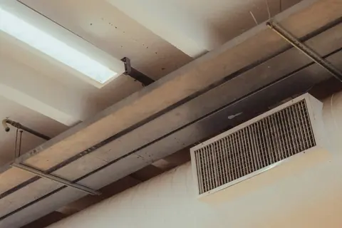 Return grille and ductwork overhead