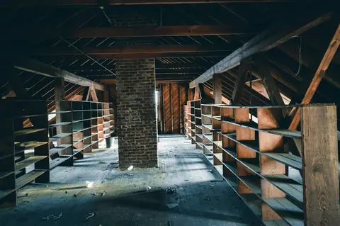 Attic with chimney and shelving