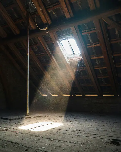 Sunlight through attic roof boards
