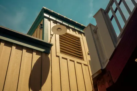 Wood-framed louvered vent