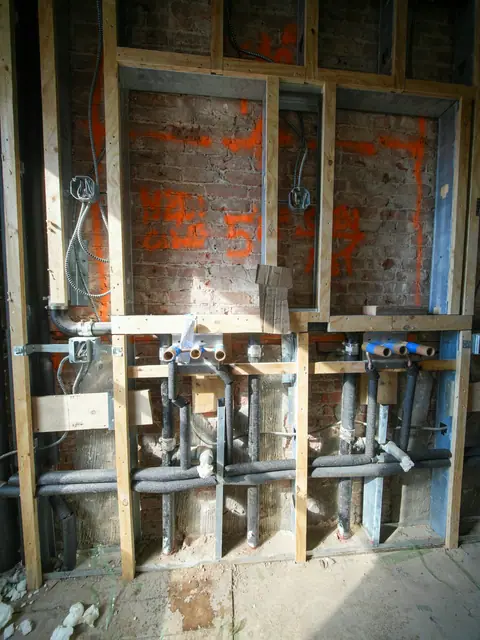 Opened brick wall with new framing